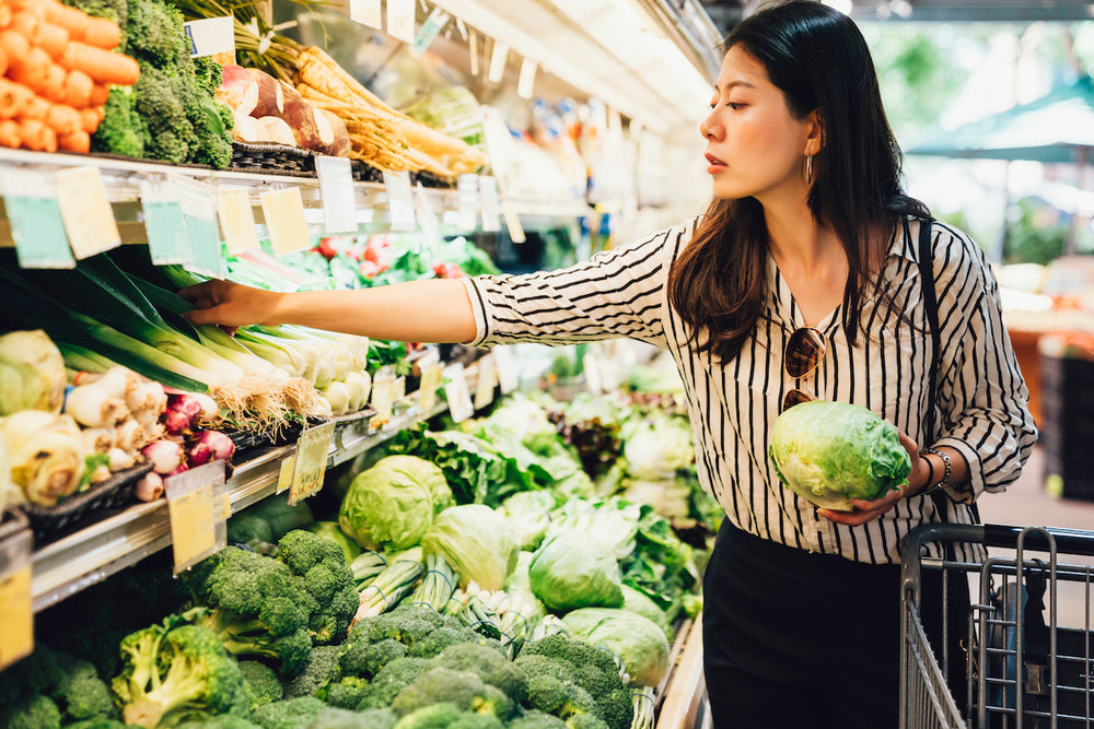 Woman shopping for vegetables